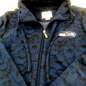 Like new Ladies Tommy Bahama jacket with Seahawks emblem.  Size medium